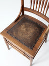 antique pressed back chair with leather seat