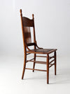 antique pressed back chair with leather seat