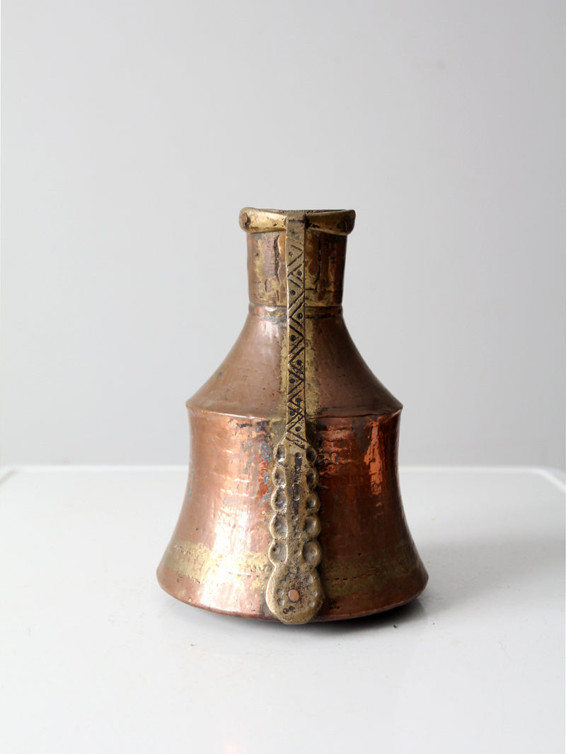 antique hammered copper pitcher