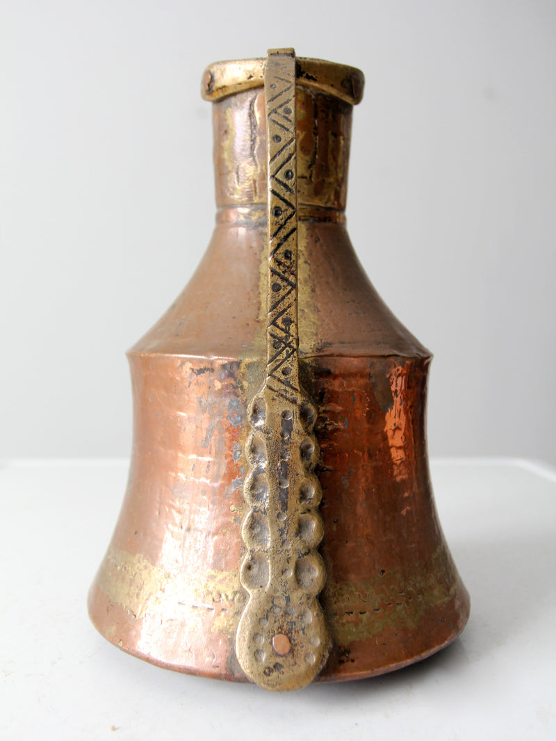 antique hammered copper pitcher