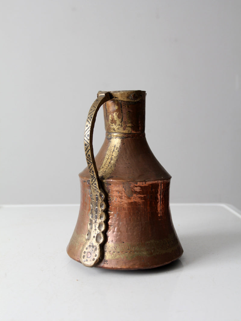 antique hammered copper pitcher