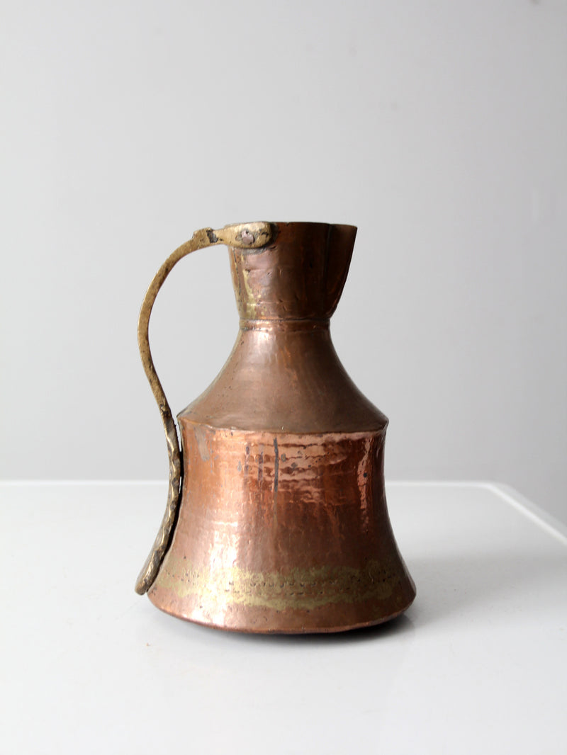 antique hammered copper pitcher