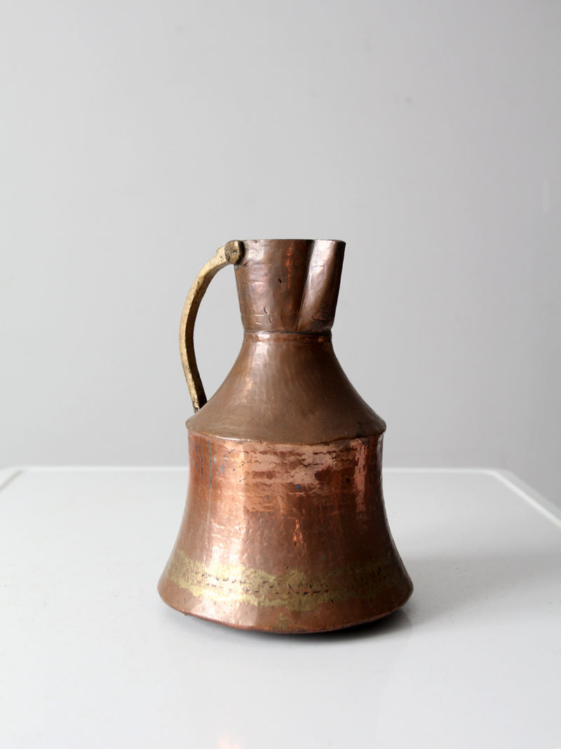 antique hammered copper pitcher