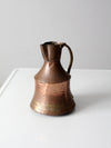 antique hammered copper pitcher