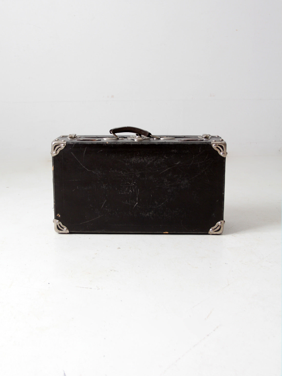 antique black suitcase