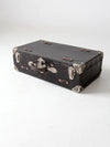 antique black suitcase