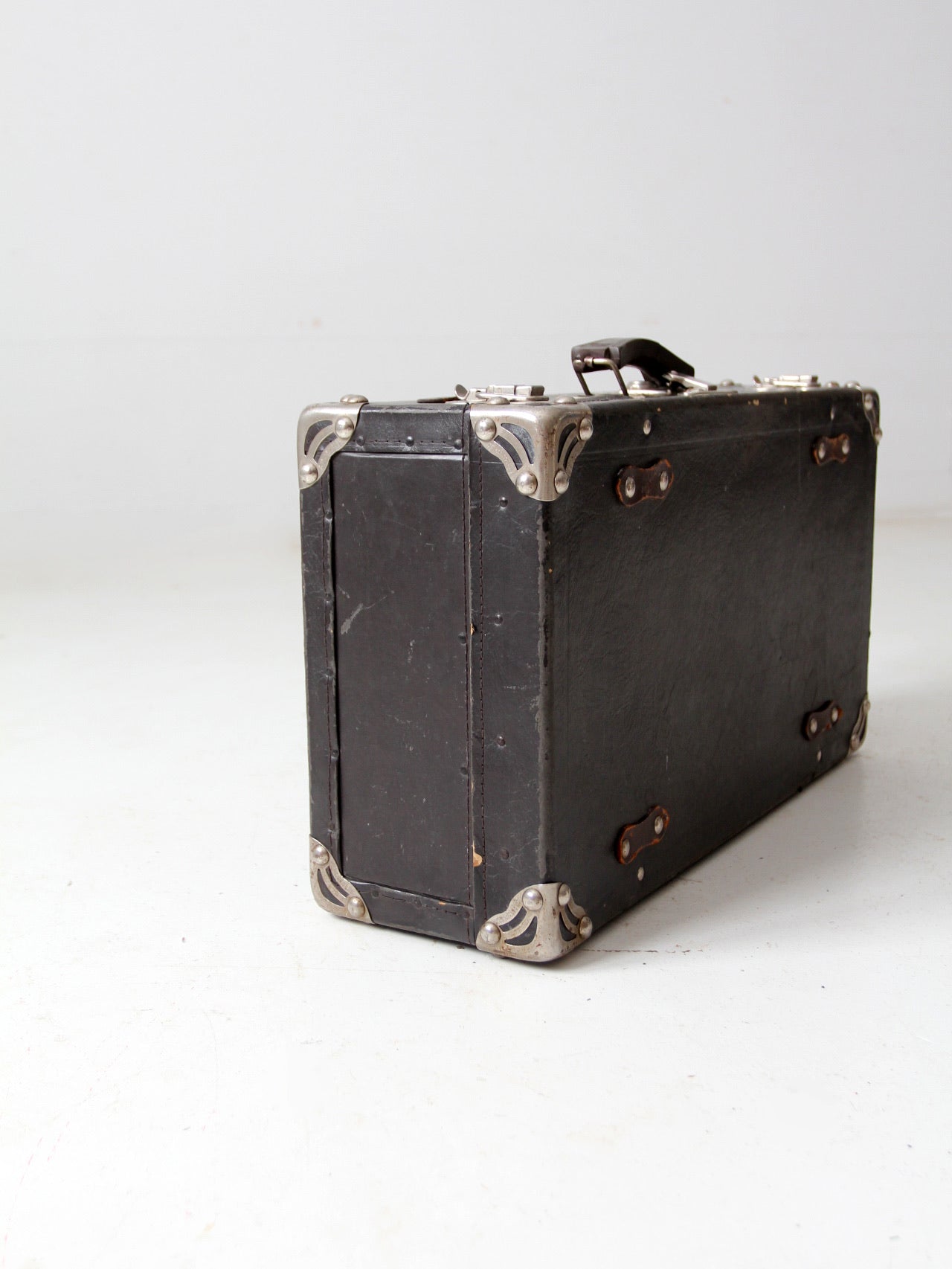 antique black suitcase