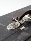 antique black suitcase