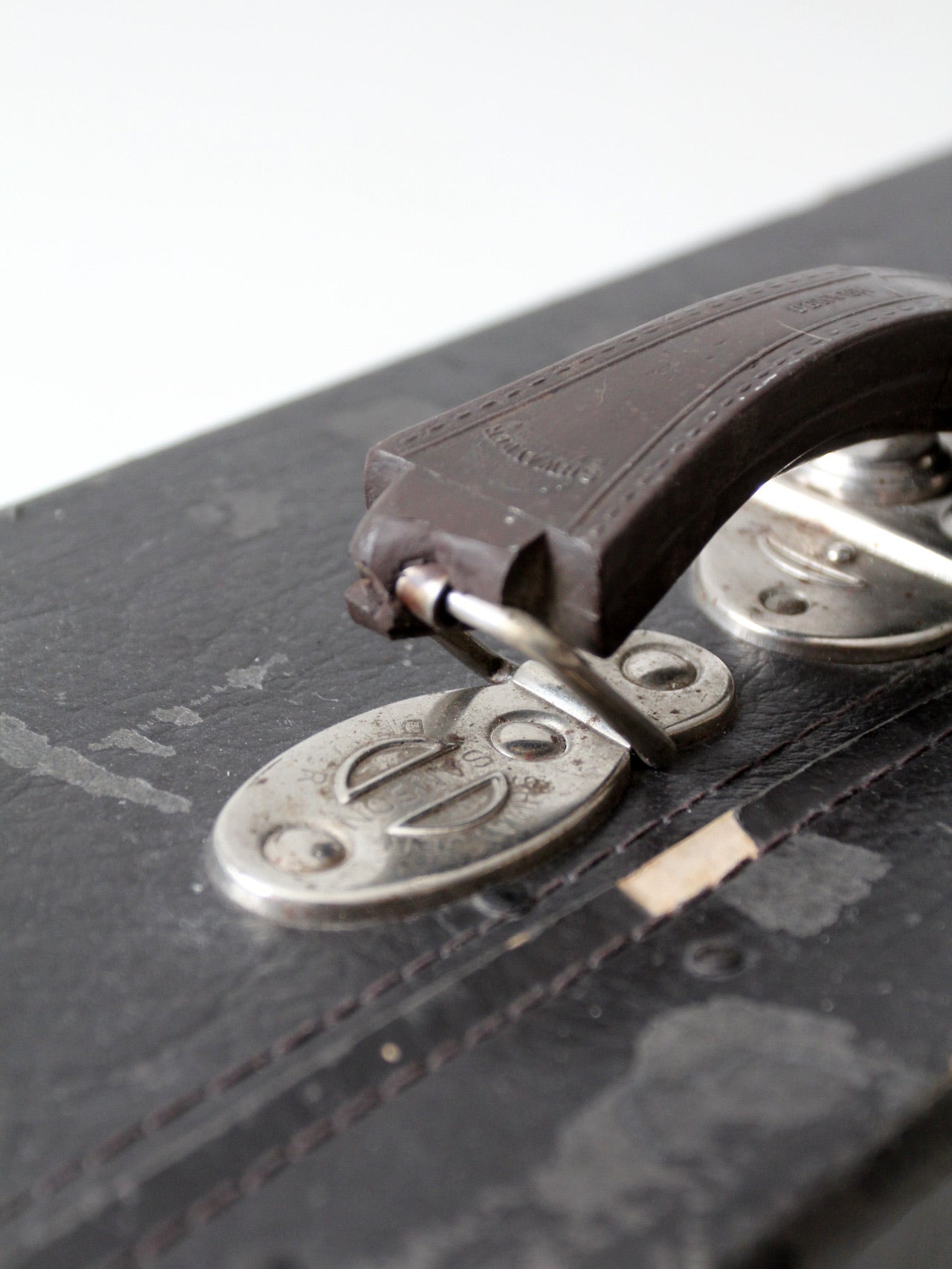 antique black suitcase