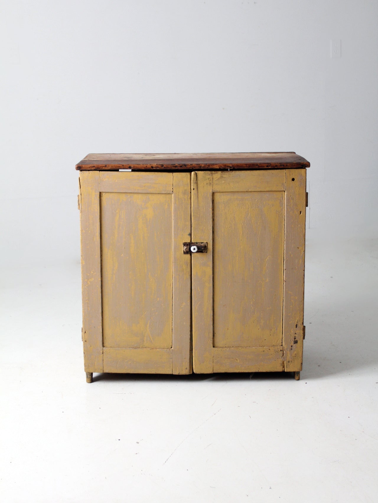 Tall clearance primitive cabinet