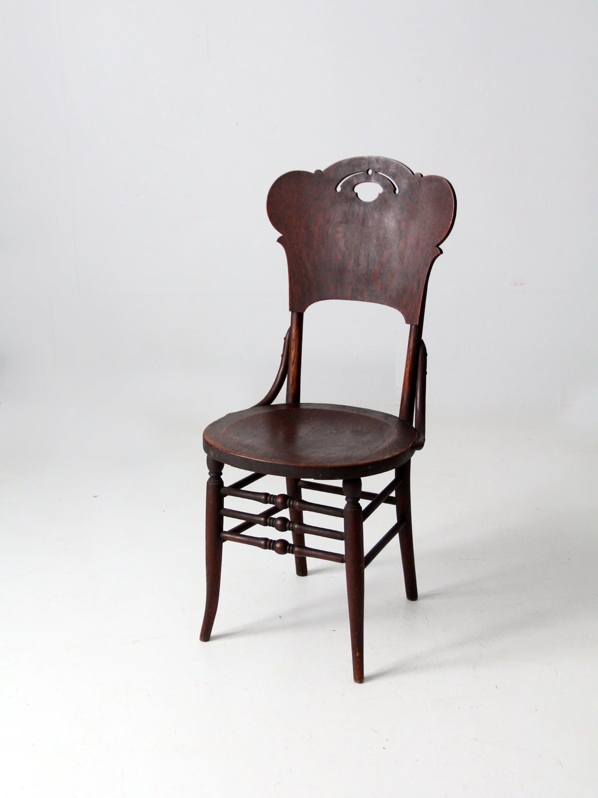 antique bentwood chair with cut out back