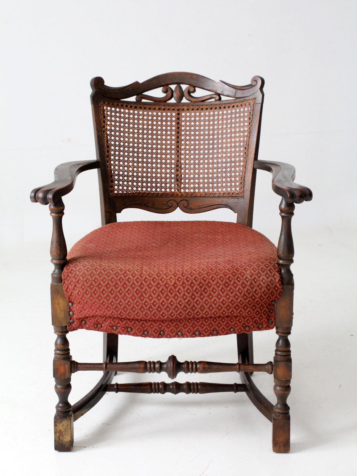 antique Louis Xlll style arm chair with cane back