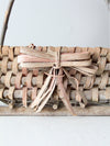 vintage Adirondack style twig basket with bow