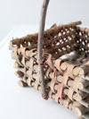 vintage Adirondack style twig basket with bow