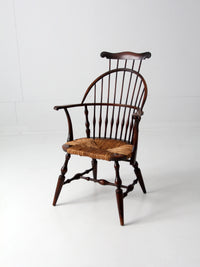 antique Windsor arm chair with rush seat