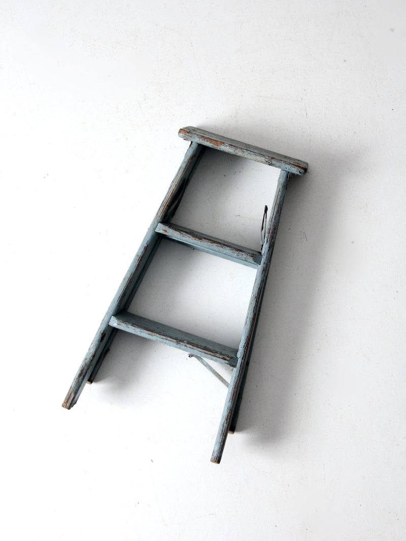 vintage wooden blue step ladder