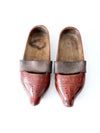 antique carved wood clogs