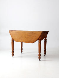 antique wooden drop leaf table