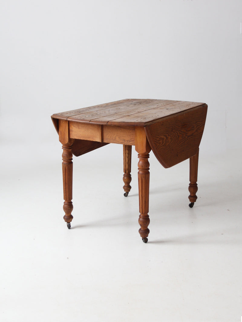 antique wooden drop leaf table