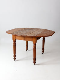 antique wooden drop leaf table