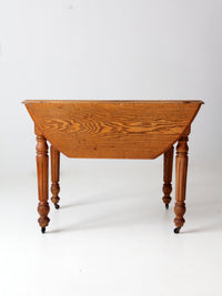 antique wooden drop leaf table