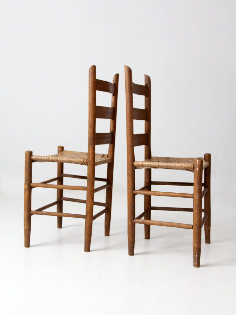 antique splint weave chair pair