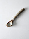 vintage pottery spoon