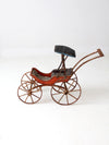 Victorian doll carriage with canopy