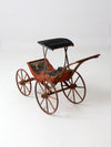 Victorian doll carriage with canopy