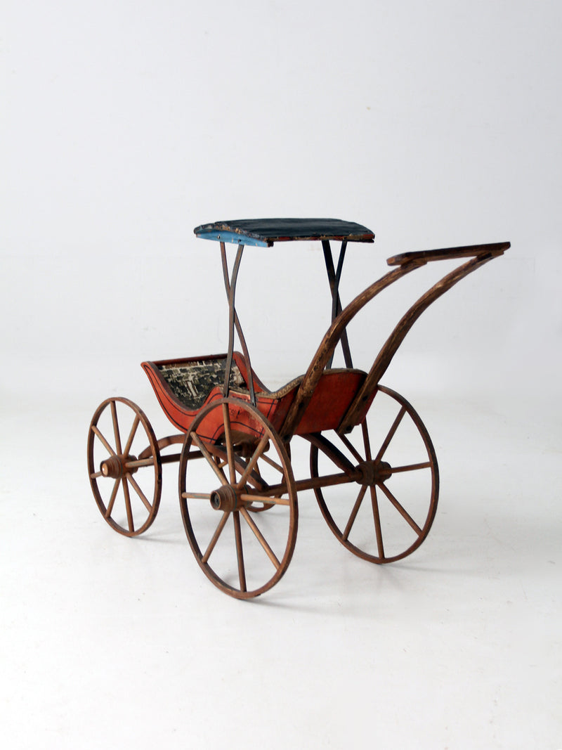 Victorian doll carriage with canopy