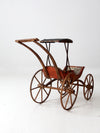 Victorian doll carriage with canopy