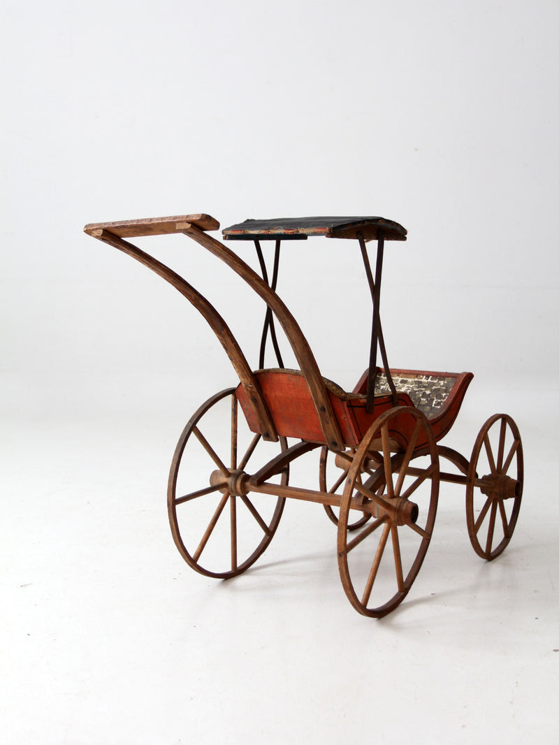 Victorian doll carriage with canopy