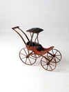 Victorian doll carriage with canopy