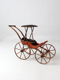 Victorian doll carriage with canopy