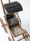 Victorian doll carriage with canopy