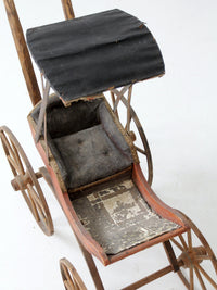 Victorian doll carriage with canopy