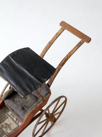 Victorian doll carriage with canopy