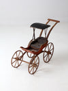 Victorian doll carriage with canopy