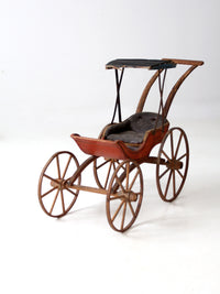 Victorian doll carriage with canopy
