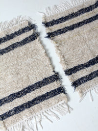 vintage hand loomed rug pair