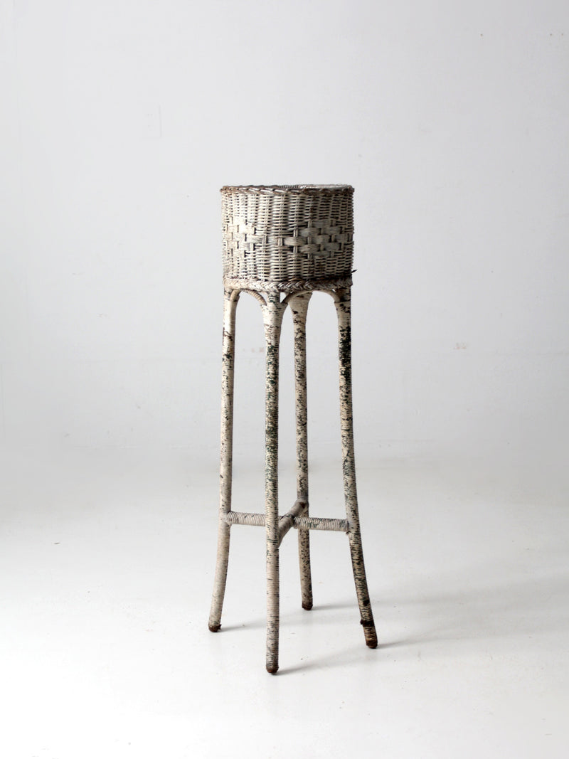 antique white wicker planter