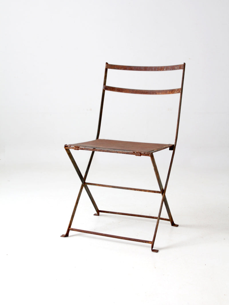 antique folding iron bistro chair