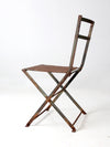 antique folding iron bistro chair