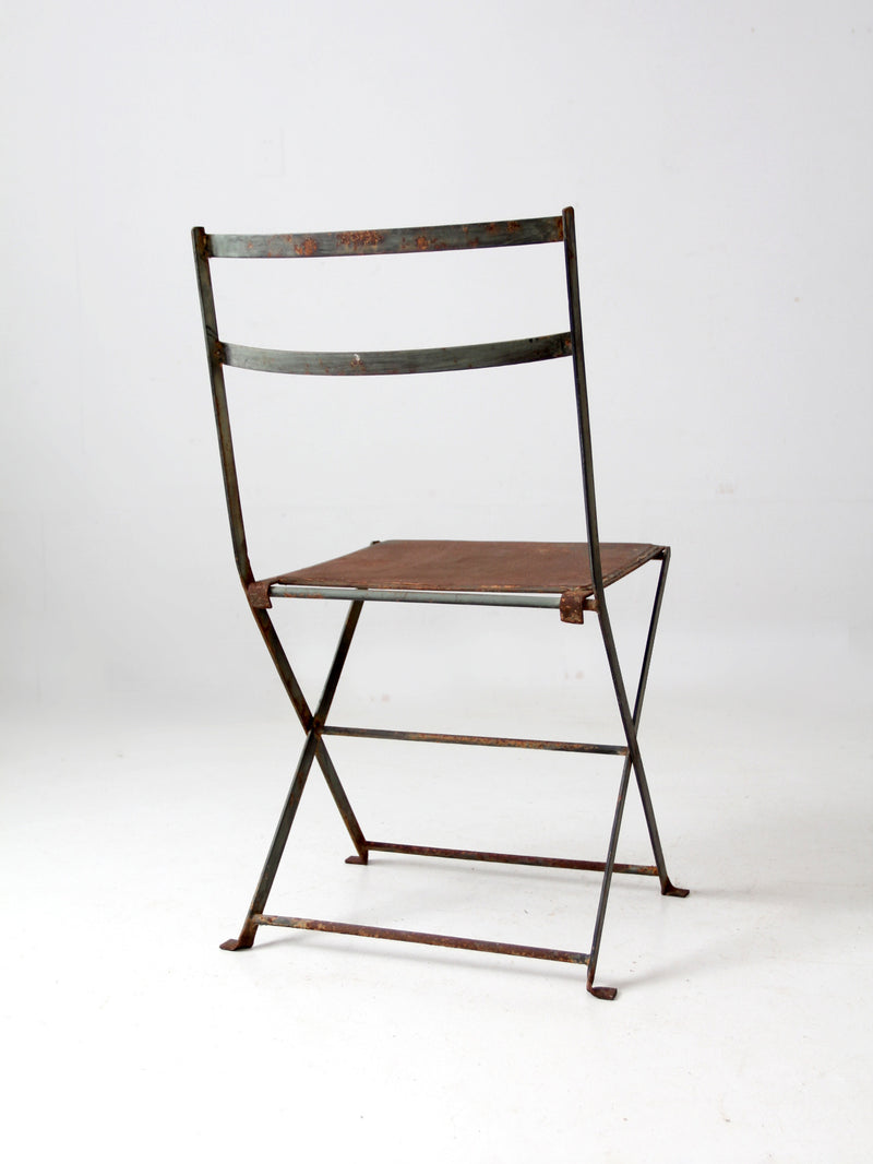 antique folding iron bistro chair