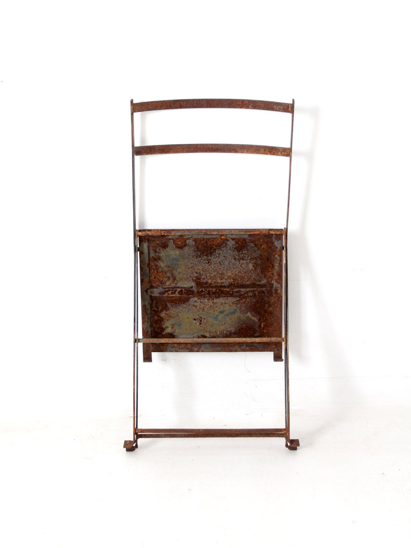 antique folding iron bistro chair