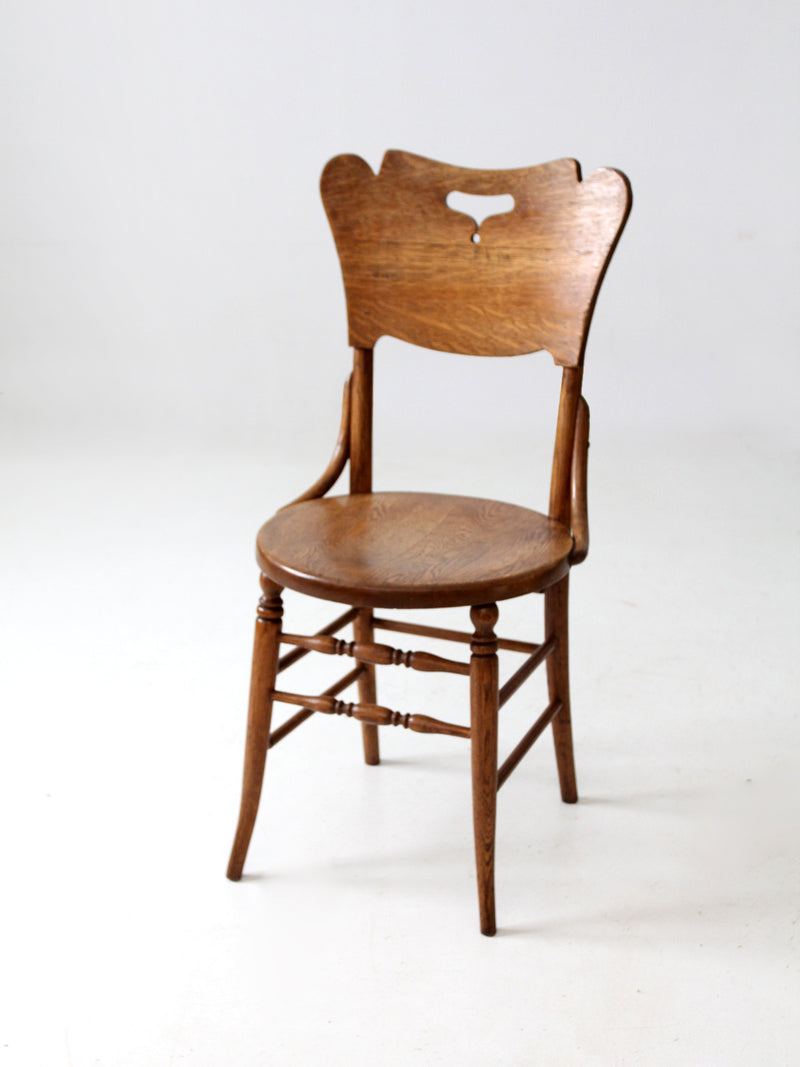 antique bentwood chair with cutout back