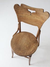 antique bentwood chair with cutout back