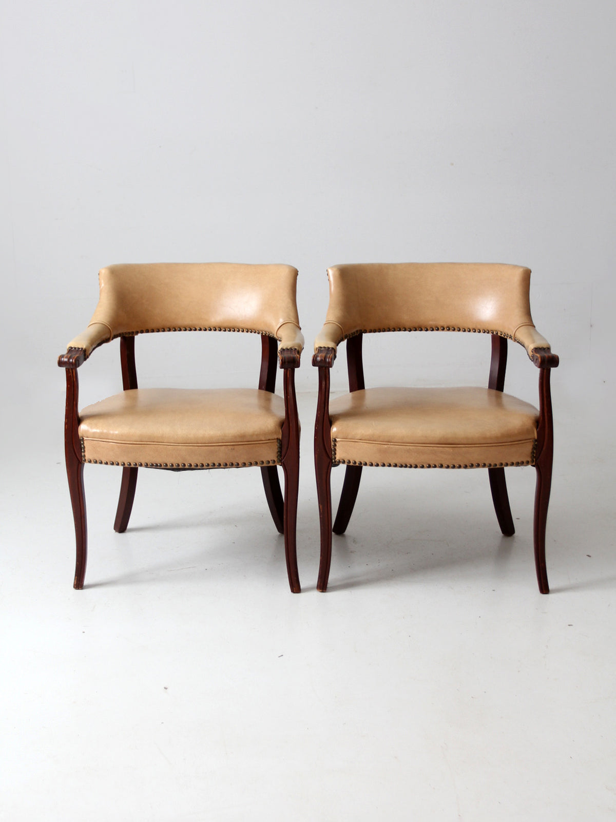 mid century captain's chairs pair