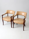 mid century captain's chairs pair