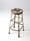 vintage industrial stool with wood seat